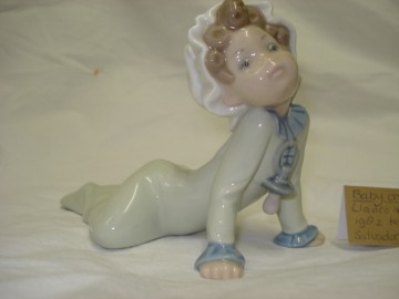 Lladro,Baby on the floor.