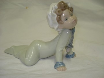 Lladro,Baby on the floor.