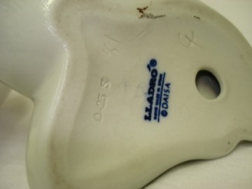 Lladro,Baby on the floor.